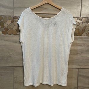 White Top. Back gathers w/ V-neck line.
